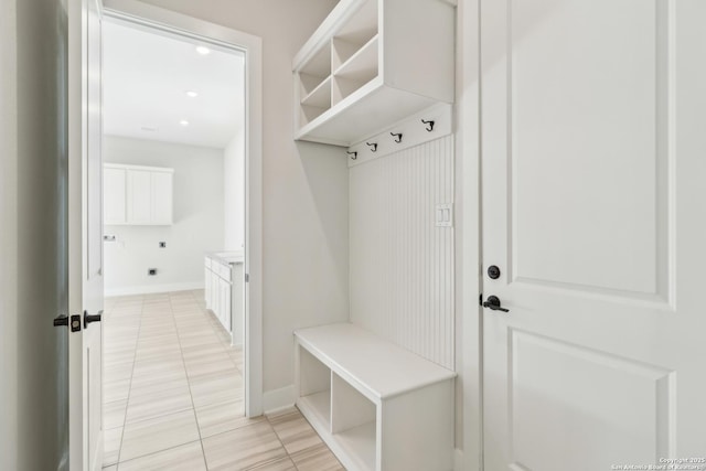 mudroom featuring baseboards