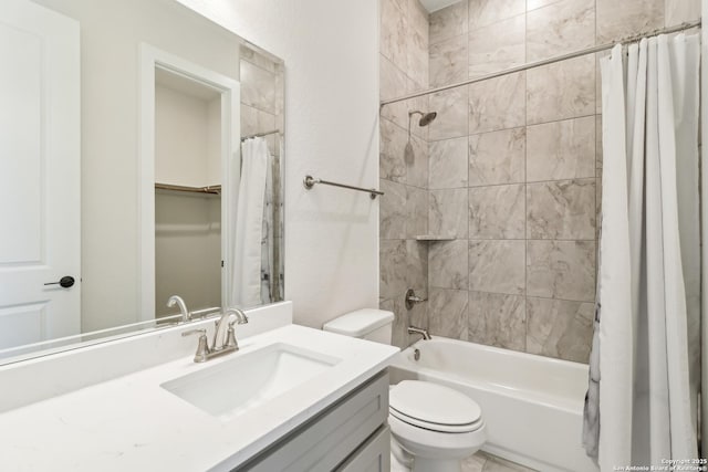 full bathroom featuring vanity, toilet, and shower / tub combo with curtain