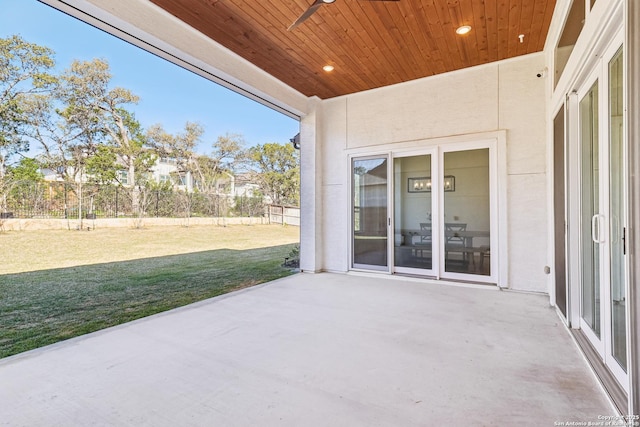 view of patio / terrace featuring fence