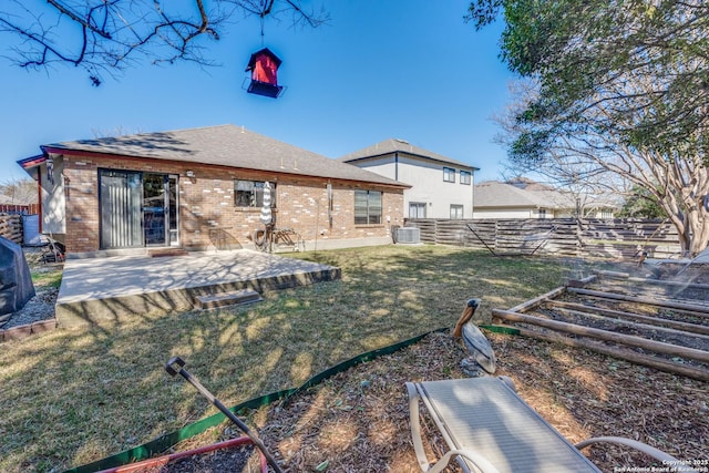 view of yard featuring central AC, a patio, a vegetable garden, and a fenced backyard