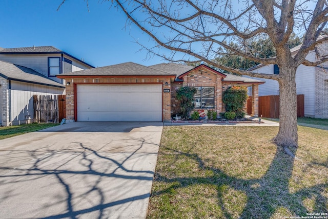 ranch-style home featuring brick siding, fence, a front yard, driveway, and an attached garage