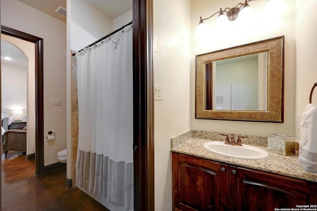 133 Fair Spgs, Boerne, TX 78006 - full bath with vanity, toilet, curtained shower, and connected bathroom