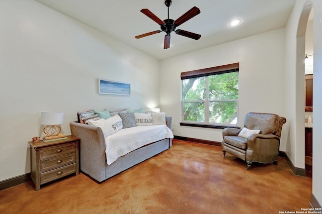 133 Fair Spgs, Boerne, TX 78006 - bedroom featuring baseboards, arched walkways, finished concrete flooring, recessed lighting, and ceiling fan