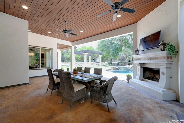 133 Fair Spgs, Boerne, TX 78006 - view of patio with a ceiling fan, outdoor dining space, and a pool with connected hot tub