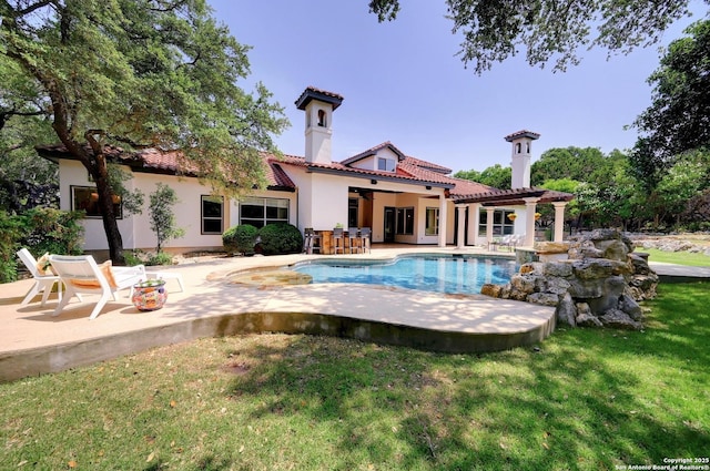 133 Fair Spgs, Boerne, TX 78006 - rear view of house featuring stucco siding, a tile roof, a patio, and an outdoor pool