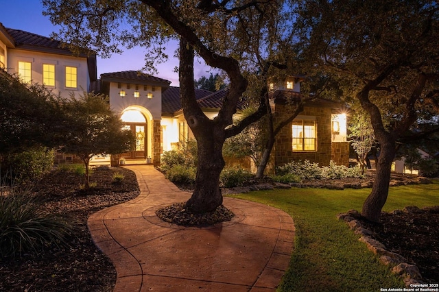 133 Fair Spgs, Boerne, TX 78006 - view of front facade with a yard, stucco siding, and a tile roof
