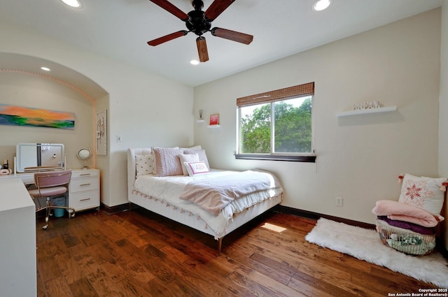 133 Fair Spgs, Boerne, TX 78006 - bedroom with dark wood-type flooring, recessed lighting, baseboards, a ceiling fan, and a desk