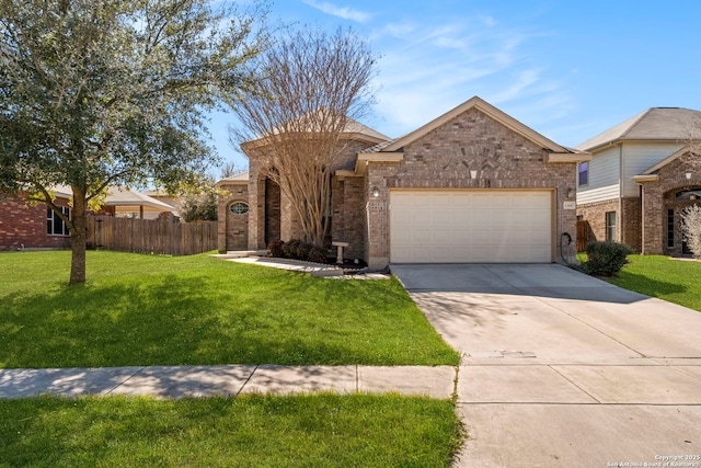 single story home featuring fence, concrete driveway, a front yard, a garage, and brick siding