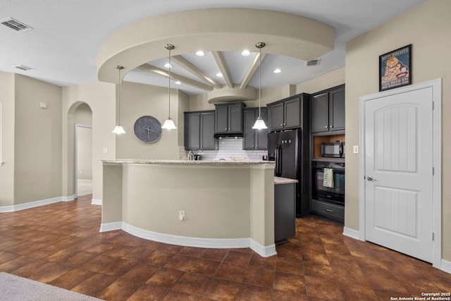 kitchen with decorative light fixtures, visible vents, backsplash, and black appliances