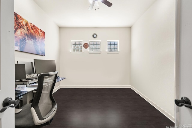 office featuring dark wood-type flooring, baseboards, and ceiling fan