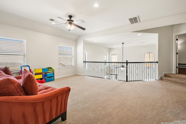 living area with recessed lighting, carpet flooring, a ceiling fan, and visible vents