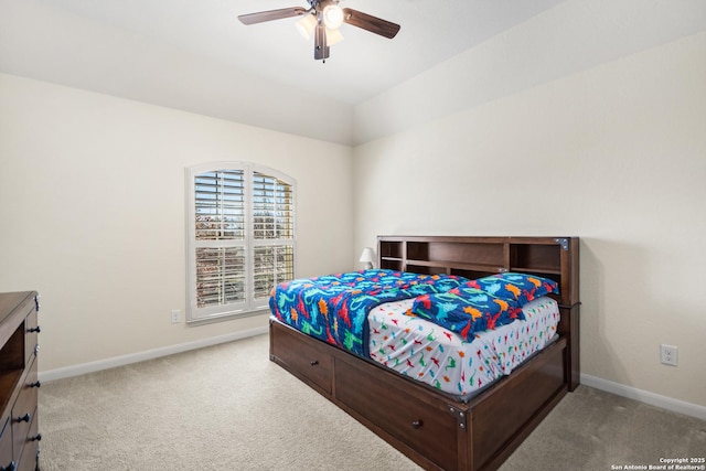 bedroom featuring carpet flooring, a ceiling fan, and baseboards