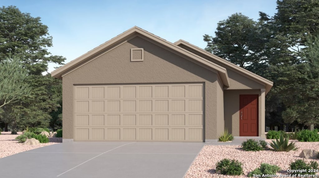 14923 Onyx Pl, San Antonio, TX 78223 - view of front of house featuring an outdoor structure, an attached garage, driveway, and stucco siding