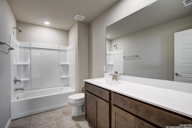 full bath featuring visible vents, toilet, vanity, and bathtub / shower combination