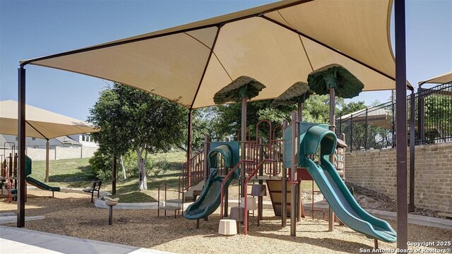 community play area featuring fence