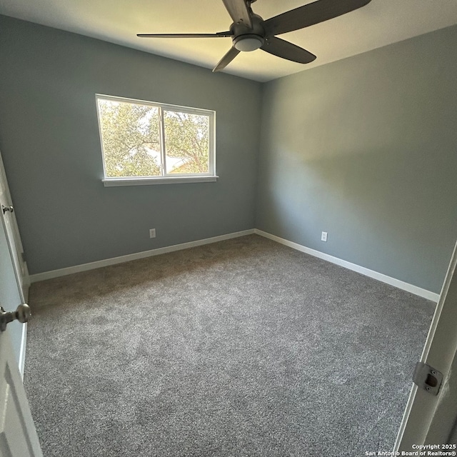 unfurnished room with baseboards, ceiling fan, and carpet flooring