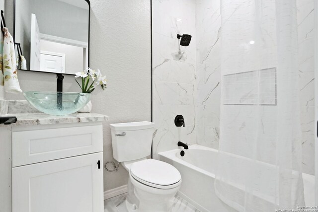 650 Canyon Cir, Canyon Lake, TX 78133 - full bathroom featuring vanity, toilet, shower / washtub combination, and a textured wall