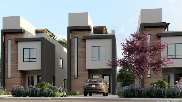 view of front of home featuring stucco siding