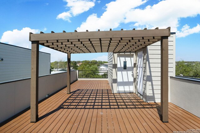 wooden deck with a pergola