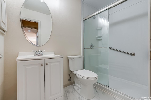 full bathroom featuring vanity, toilet, marble finish floor, and a shower stall