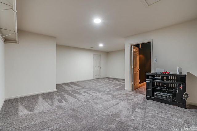 basement featuring carpet flooring, recessed lighting, and baseboards