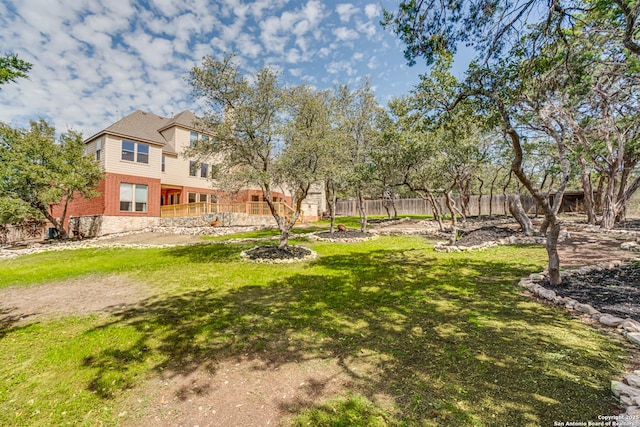 view of yard featuring fence