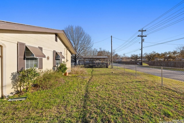 view of yard with fence