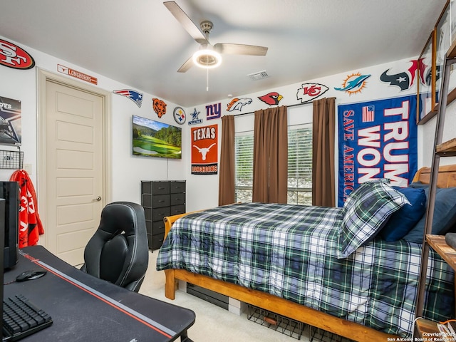 bedroom featuring visible vents, ceiling fan, and carpet flooring