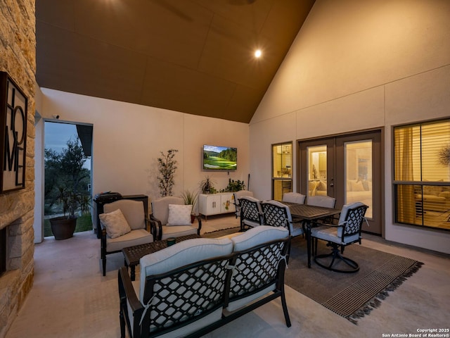 view of patio featuring outdoor dining area, french doors, and an outdoor hangout area