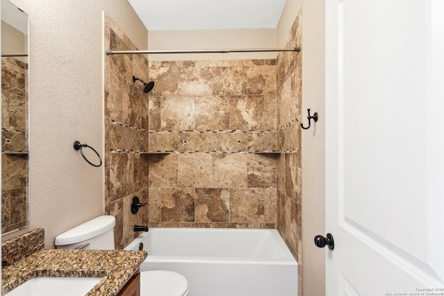 full bathroom featuring bathing tub / shower combination, toilet, and vanity