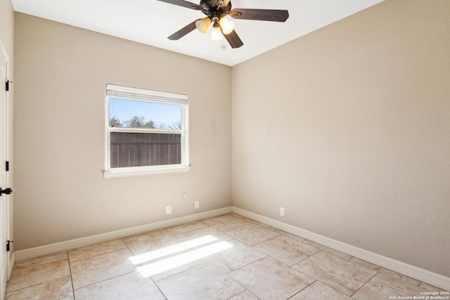 unfurnished room featuring light tile patterned flooring, ceiling fan, and baseboards