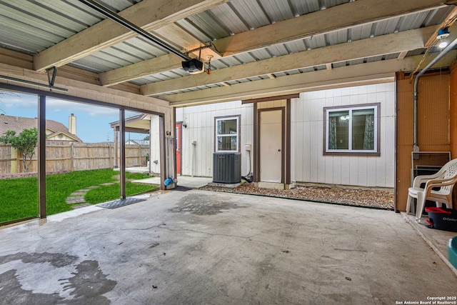 exterior space featuring cooling unit and fence