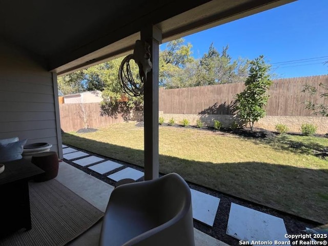 exterior space featuring a fenced backyard