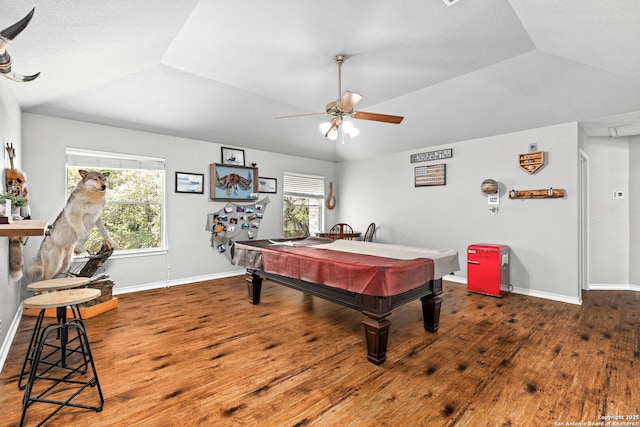 playroom with wood finished floors, a healthy amount of sunlight, baseboards, and lofted ceiling