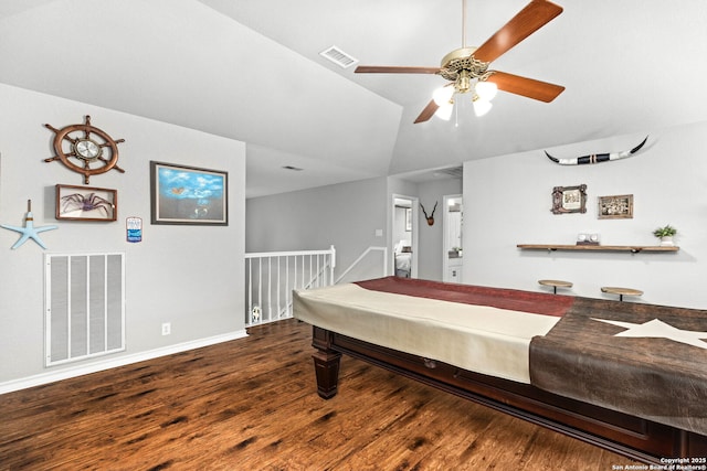 game room featuring visible vents, baseboards, wood finished floors, and vaulted ceiling