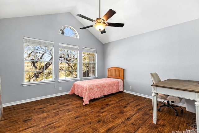 bedroom featuring a ceiling fan, wood finished floors, baseboards, and high vaulted ceiling