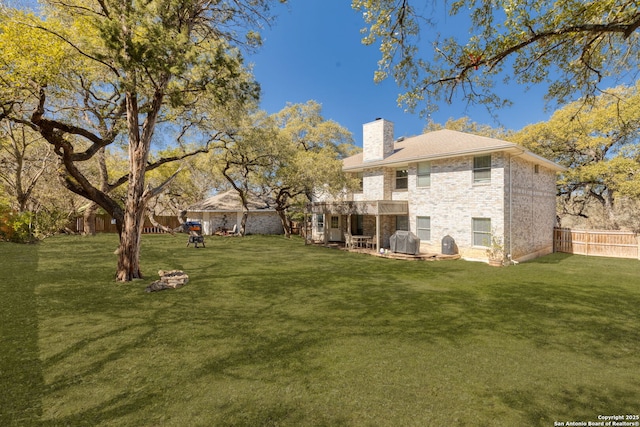 view of yard featuring a patio area and fence