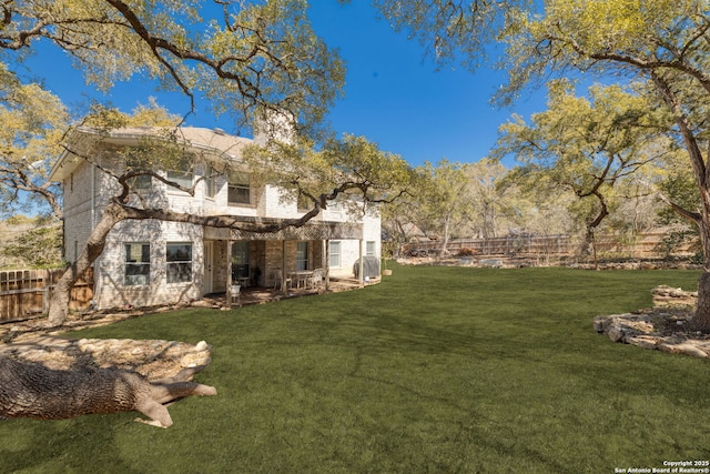 view of yard featuring fence