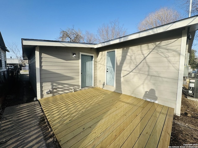 wooden deck with central AC unit