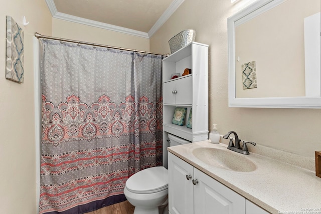 full bathroom featuring toilet, ornamental molding, a shower with curtain, wood finished floors, and vanity