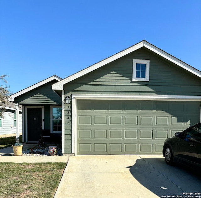 view of front of house featuring a garage and driveway