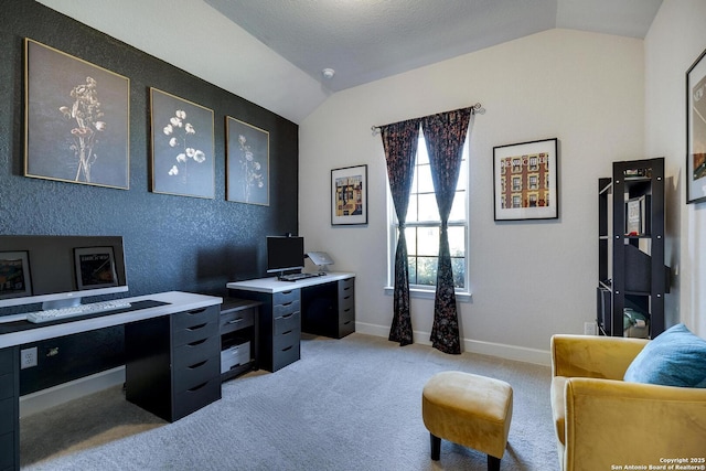 office with light carpet, baseboards, and lofted ceiling