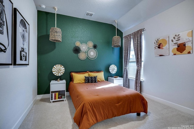 carpeted bedroom featuring visible vents, lofted ceiling, and baseboards