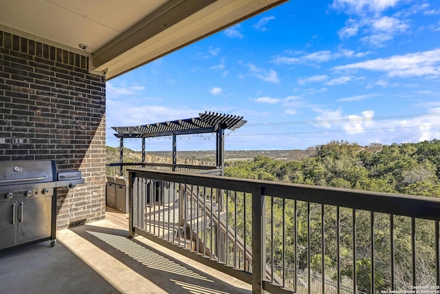 balcony featuring area for grilling and a pergola