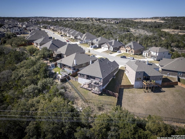 birds eye view of property with a residential view