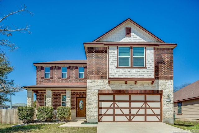 view of front of property featuring stone siding, concrete driveway, an attached garage, and fence