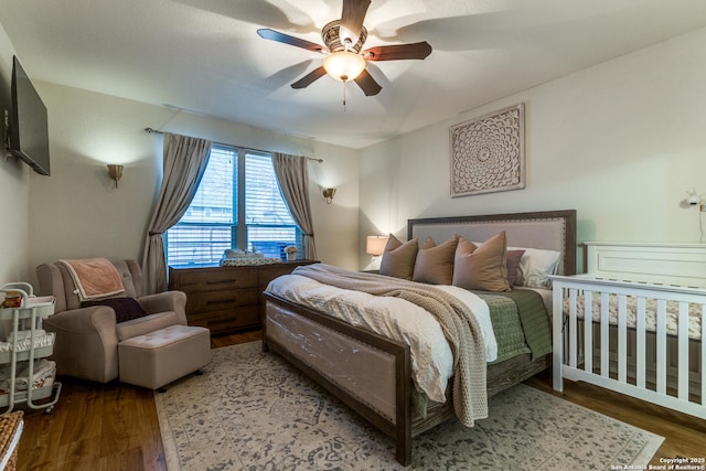 bedroom featuring ceiling fan and wood finished floors