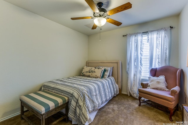 carpeted bedroom with baseboards and ceiling fan