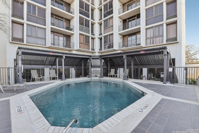 view of pool featuring a patio