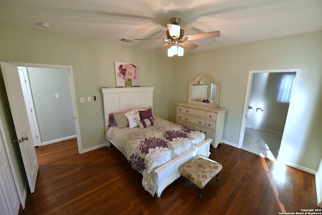 bedroom featuring visible vents, baseboards, dark wood-type flooring, and ceiling fan